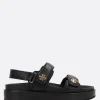 Sandali>TORY BURCH sandalo flat Kira in pelle martellata Nero
